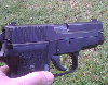 Sig228 R quarter.jpg